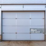 Closed Metal Automatic Garage Door Building Exterior