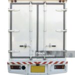White cargo container and truck isolated on white background